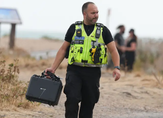 A police officer at the scene in Shoreham