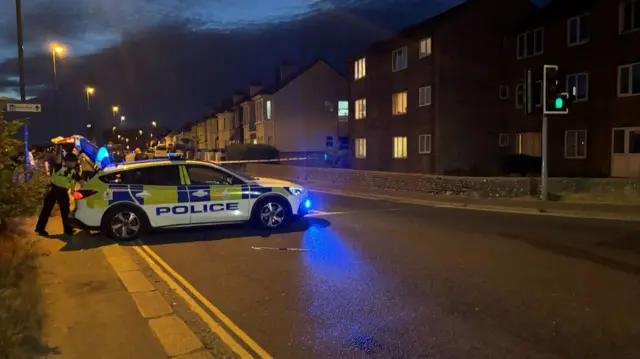 ,A new police cordon has been set up around the scene.
