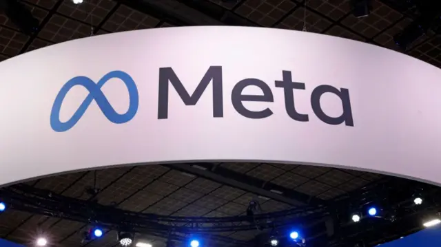 Meta written in black over a white background