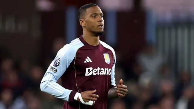 : Ezri Konsa of Aston Villa looks on