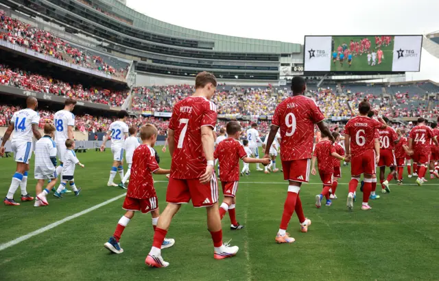 Players walk out