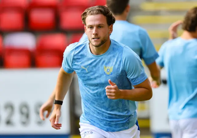St Johnstone's Jamie Gullan warms up