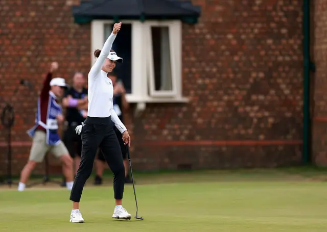 Esther Henseleit with caddie celebrating