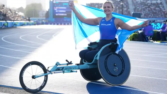 Melanie Woods of Scotland celebrates winning gold