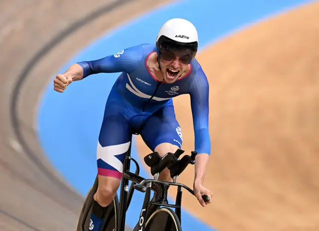 Fin Graham of Team Scotland celebrates as race winner