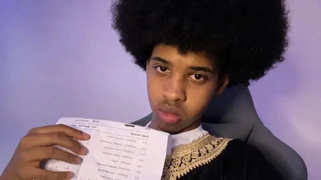 Abdi holding his results transcript