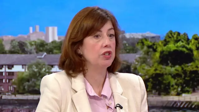 Lucy Powell in a cream jacket on the BBC sofa