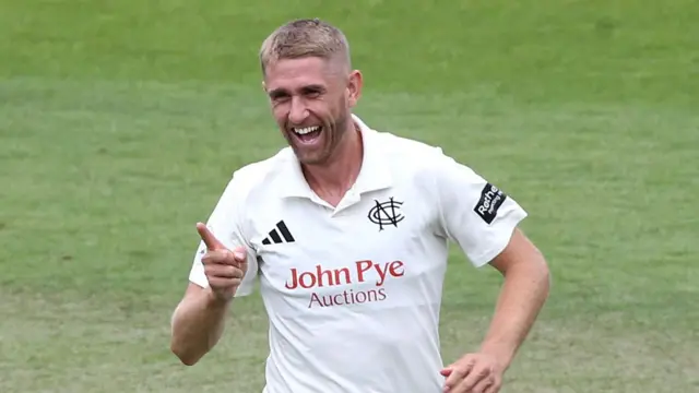 Olly Stone celebrates the wicket of Adam Thomas