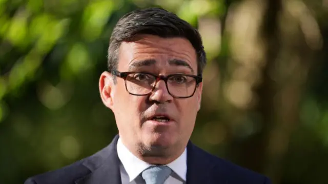 A headshot of Andy Burnham