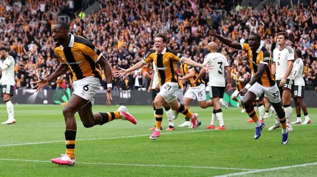 Semi Ajayi of Hull City celebrates scoring his team’s first goal during the Premier League 2026/27 match between Hull City and Manchester United at MKM Stadium.