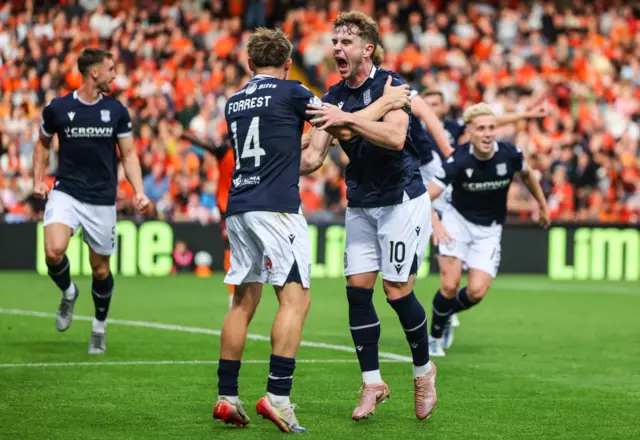 Dundee players celebrate