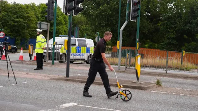 Pictures show the police cordon near the scene