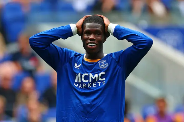 Thierno Barry with his hands on his head