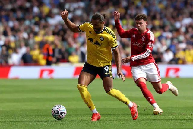 Dominic Calvert-Lewin of Leeds United controls the ball while under pressure from Neco Williams of Nottingham Forest during the Premier League 2026/27 match between Nottingham Forest FC and Leeds United at City Ground.