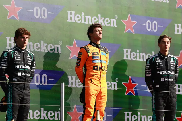 Kimi Antonelli, Lando Norris and George Russell on the podium at the 2026 Dutch Grand Prix