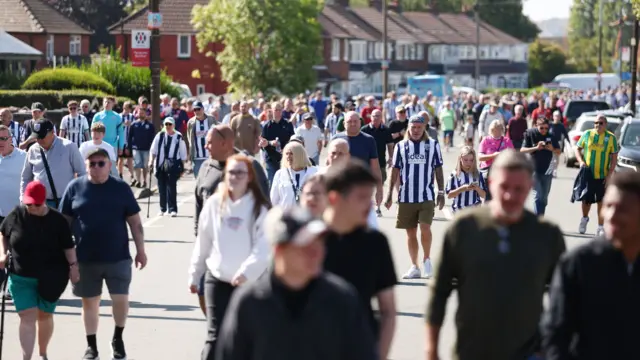 Fans arrive at the Hawthorns