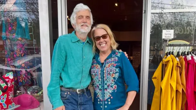 Mike Roach and Kim Osgood outside their shop