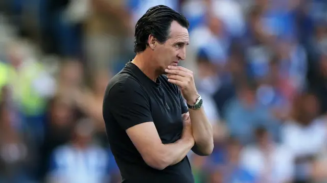 Aston Villa head coach Unai Emery. He is wearing a black shirt.