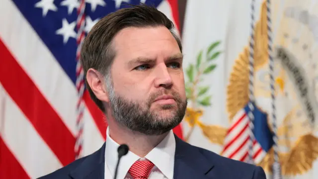 A close-up shot of JD Vance, who looks to the right