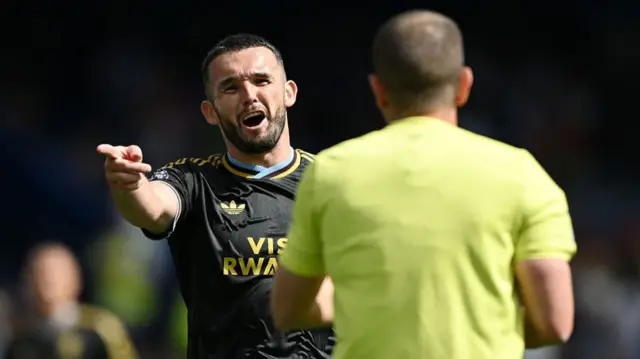 John McGinn reacts