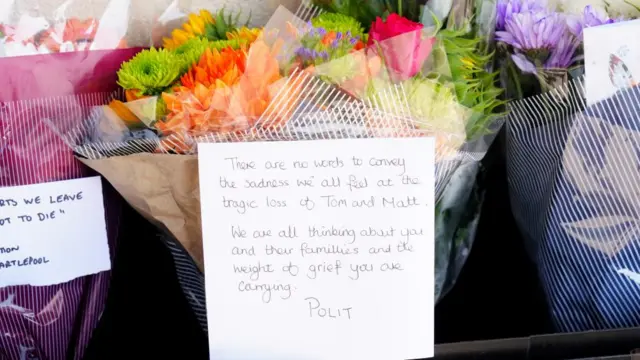 Floral tributes and words of love have been placed at the memorial garden at Cleveland HQ