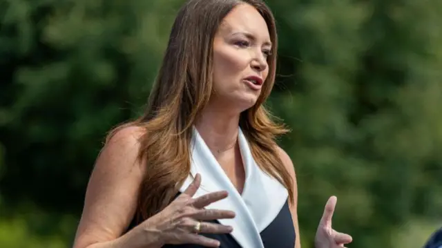 Brooke Rollins speaking to reporters in Washington