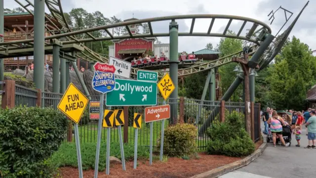Dollywood signs with roller coaster in background