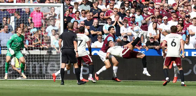 Lloyd Jones scores with an overhead kick