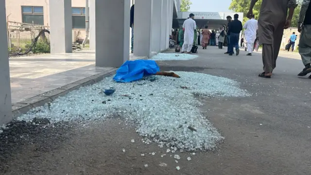 Shattered glass outside PIMS Hospital in Islamabad where a fire has killed 14 newborns