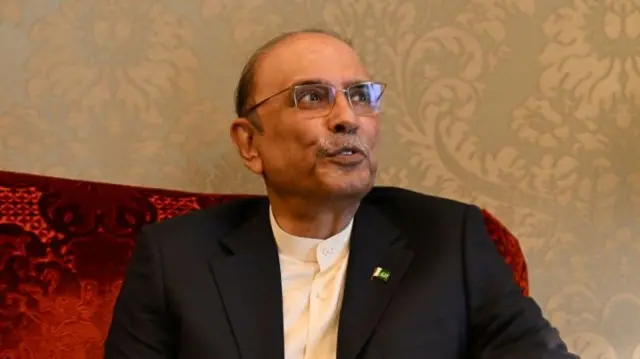 President Asif Ali Zardari sits on sofa and speaks