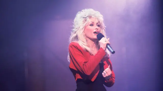 Dolly Parton on the set of the Oprah Winfrey Show in Chicago, Illinois, February 20, 1992