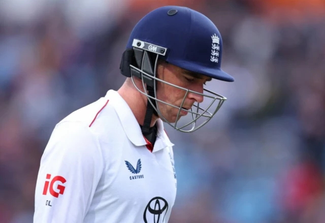 England's Dan Lawrence walks off after losing his wicket to the bowling of Pakistan's Ali Usman