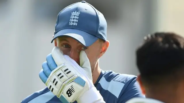 Joe Root looks on
