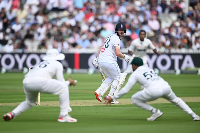 Jordan Cox of England looks back as an edge falls short of the slips