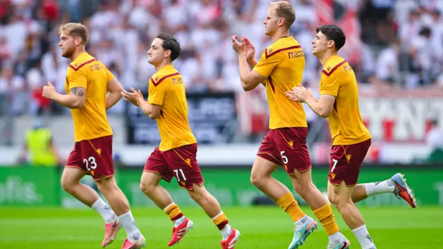 Motherwell players warming up