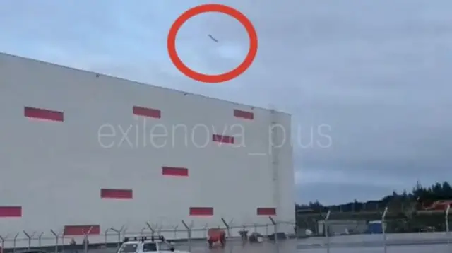 Drone passing near warehouse site