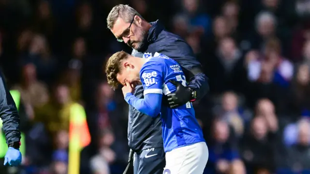 Adrian Segecic goes off with an injury