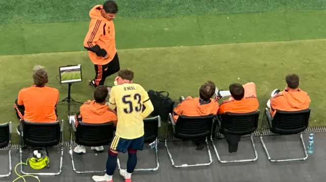 Ceadach O'Neill prepares to come on as a second-half substitute