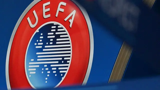 This photograph shows the UEFA logo displayed