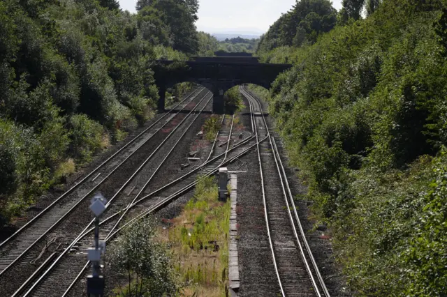 Empty train lines at Hunts Cross railway station in Liverpool