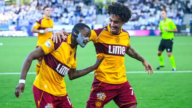 Tawanda Maswanhise and Willy Vogt celebrate for Motherwell