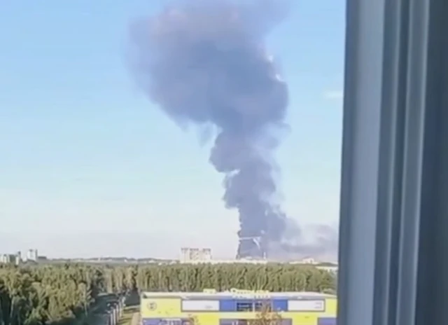 Smoke seen rising from the direction of the oil refinery in Yaroslavl, in a social media video verified by the BBC