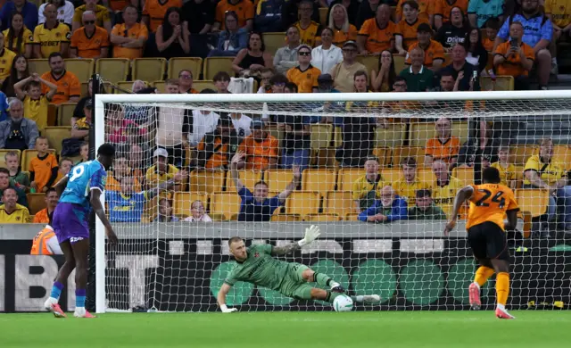 Dan Bentley saves a penalty for Wolves against Port Vale