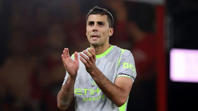 Rodri of Manchester City acknowledges the fans following the team's 1-1 draw