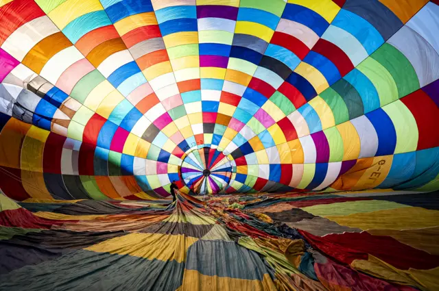 The inside of a partially deflated hot air balloon.
