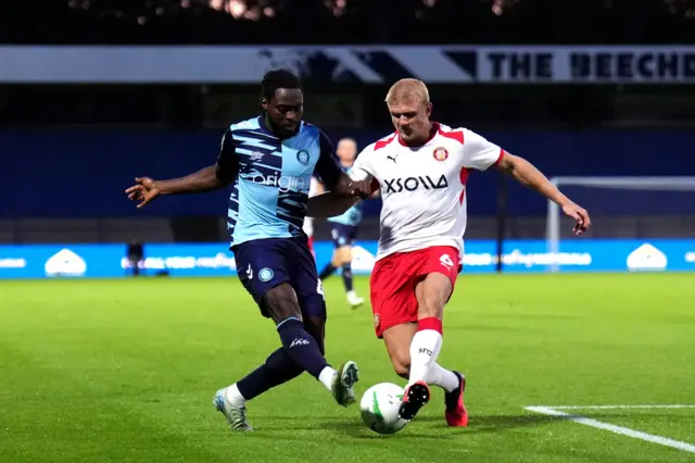 Wycombe Wanderers' Fred Onyedinma (left) and Stevenage's Lewis Freestone battle for the ball during the Carabao Cup First Round match at Adams Park, Wycombe