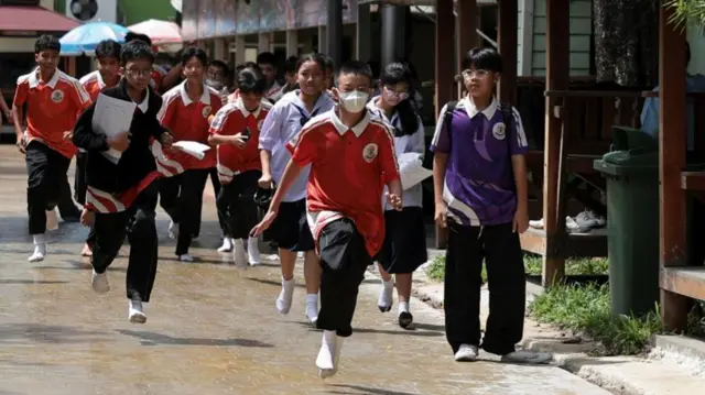 Students fleeing the school
