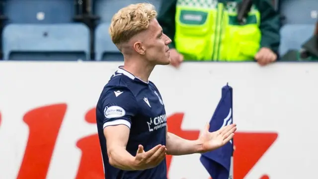 Joe Westley celebrates after scoring for Dundee against Aberdeen
