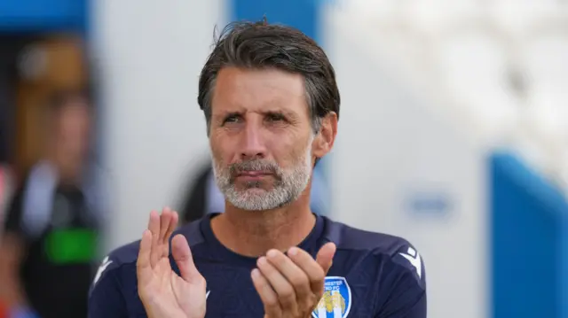 Colchester boss Danny Cowley clapping his team's efforts
