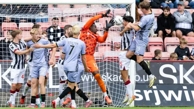 Ayr's Luke McBeth scores